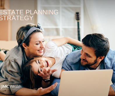 Couple and child at laptop working on estate strategy